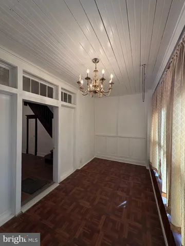 a big room with chandelier