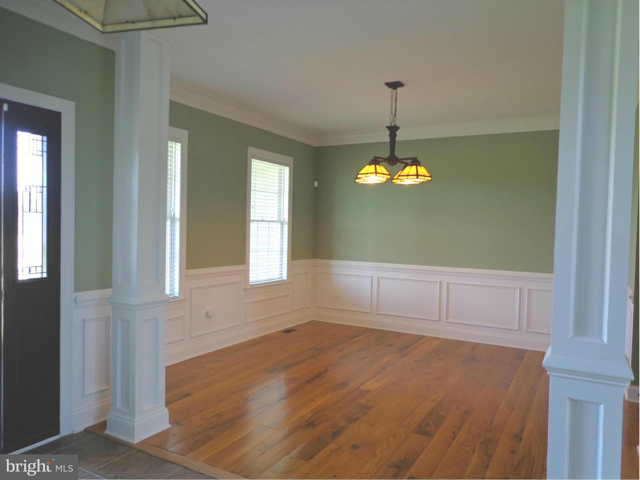 16010 Pleasure Point Ln Ridge Ridge, MD 20680 - Photo 16 of 26 Wide plank floors w/ chair rail