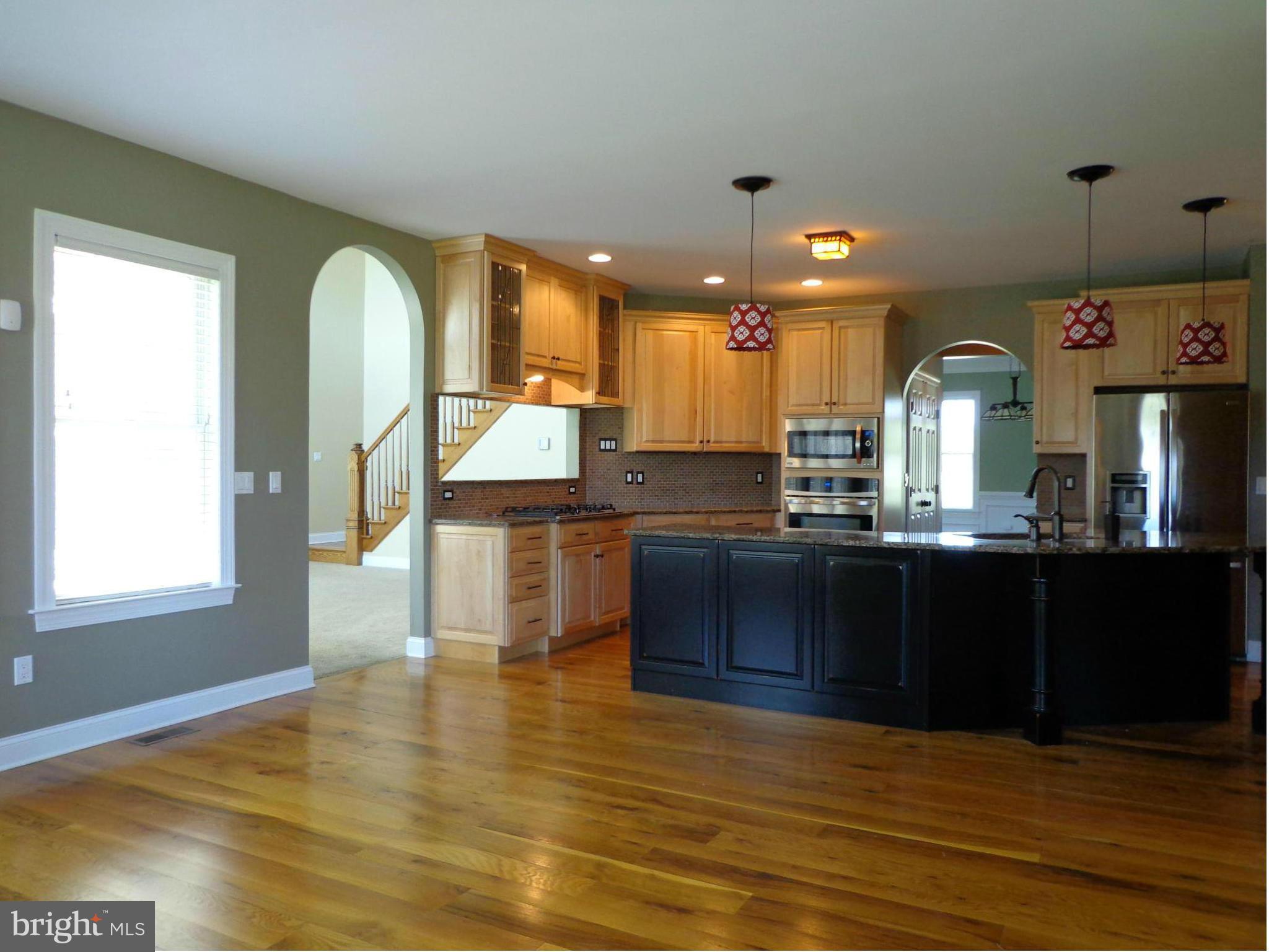 16010 Pleasure Point Ln Ridge Ridge, MD 20680 - Photo 9 of 26 Kitchen with 5-burner gas stove