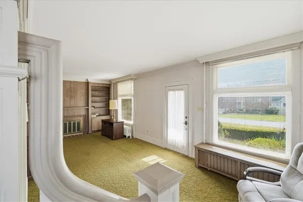 a room with furniture and a window