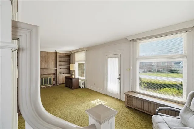 a room with furniture and a window