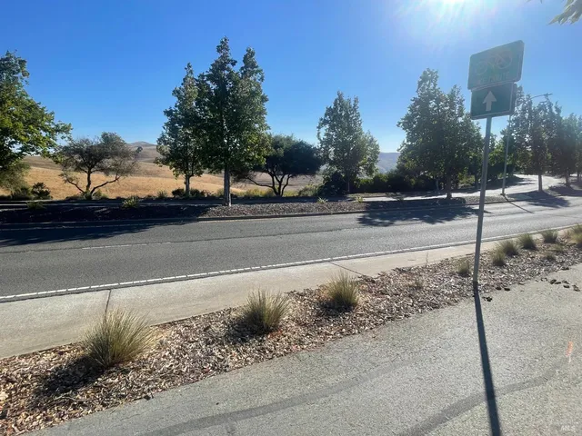 a view of a road with a mountain
