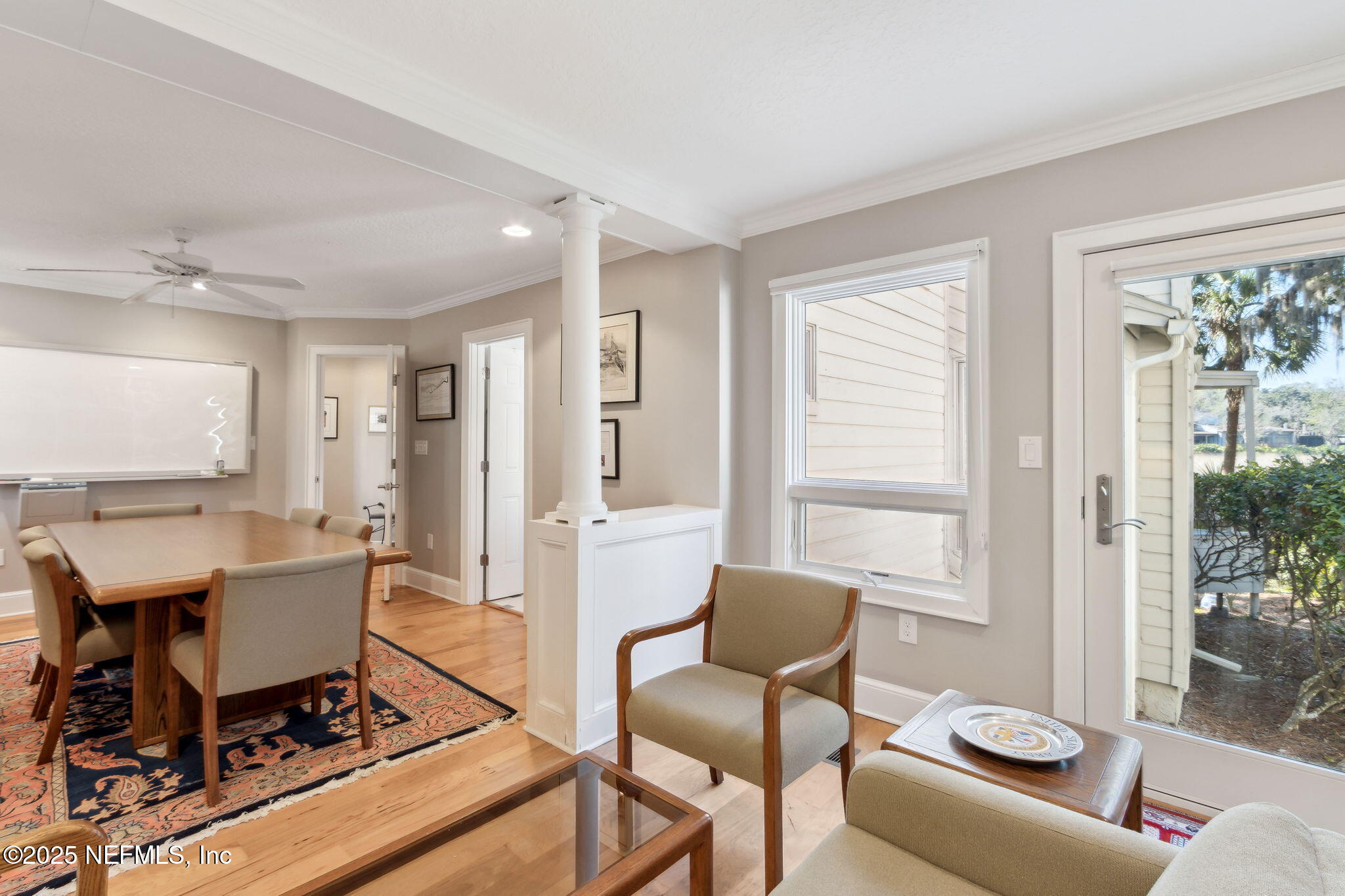 3417 Sea Marsh Road Fernandina Beach, FL 32034 - Photo 11 of 19 a view of a dining room with furniture window and outside view