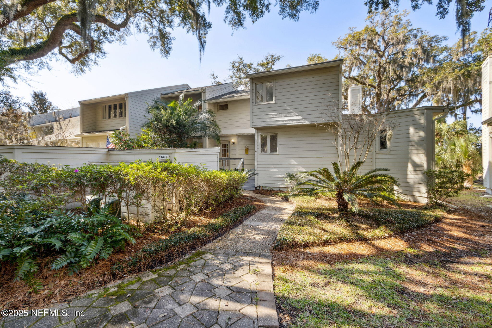 3417 Sea Marsh Road Fernandina Beach, FL 32034 - Photo 18 of 19 a view of a house with a yard