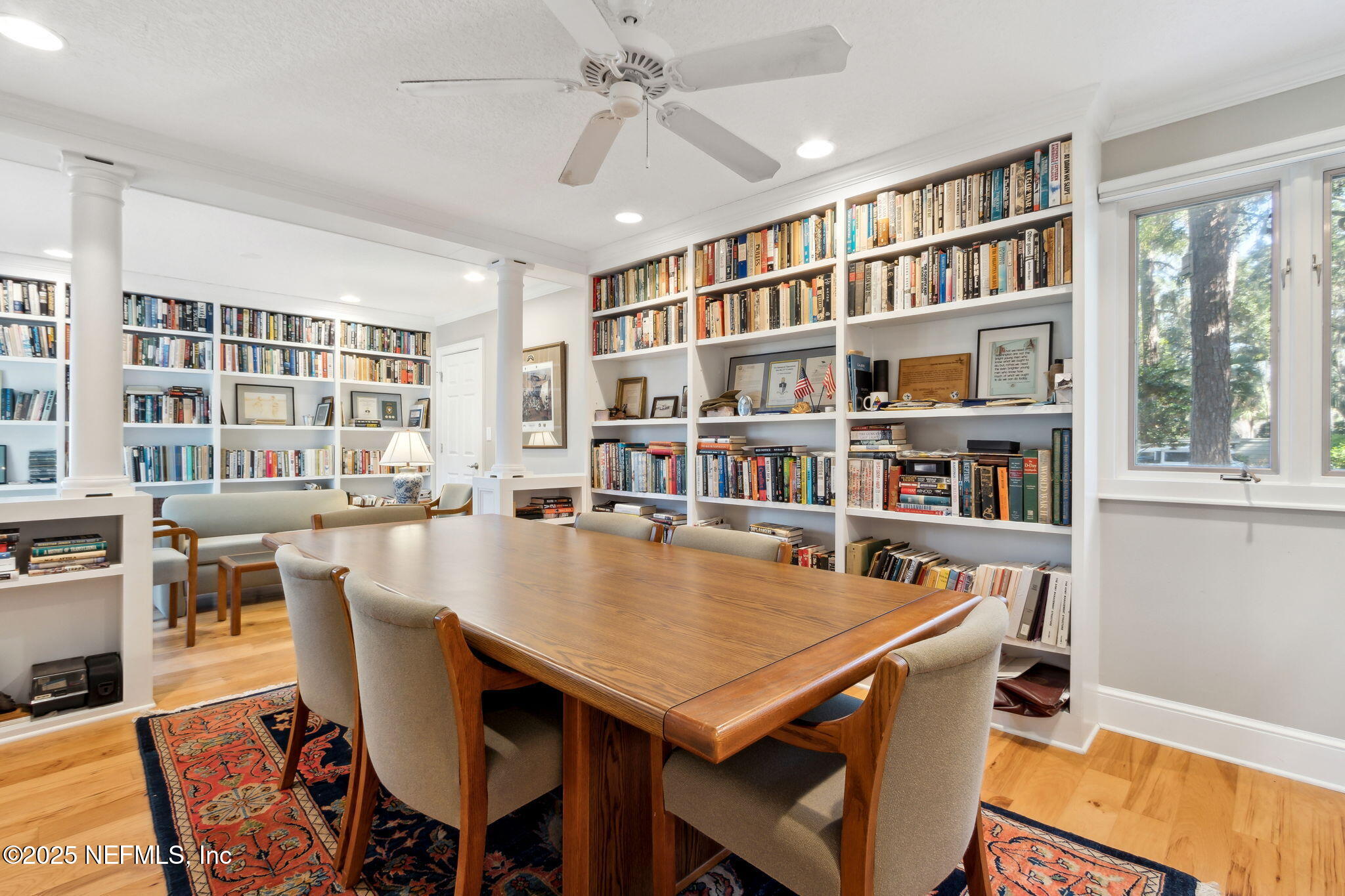 3417 Sea Marsh Road Fernandina Beach, FL 32034 - Photo 10 of 19 a view of a dining room with furniture window and wooden floor