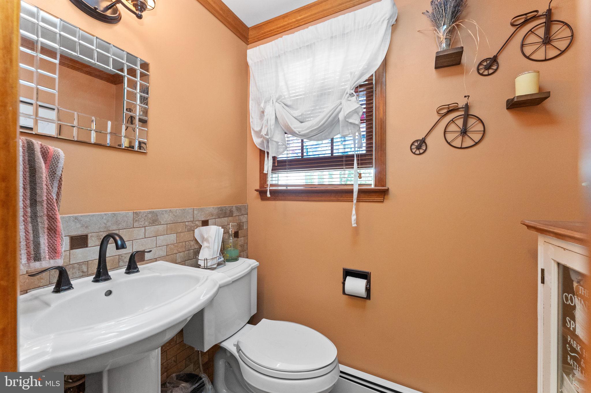 169 Centenary Lane Warminster, PA 18974 - Photo 16 of 28 a bathroom with a sink and mirror with toilet