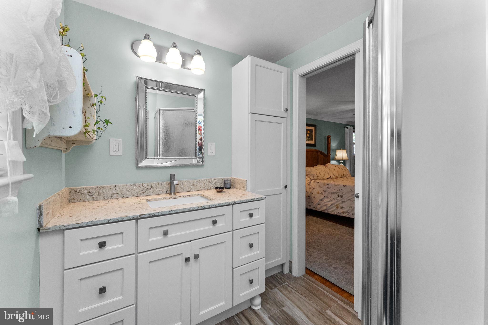 169 Centenary Lane Warminster, PA 18974 - Photo 19 of 28 a en suite bathroom with a sink and a mirror