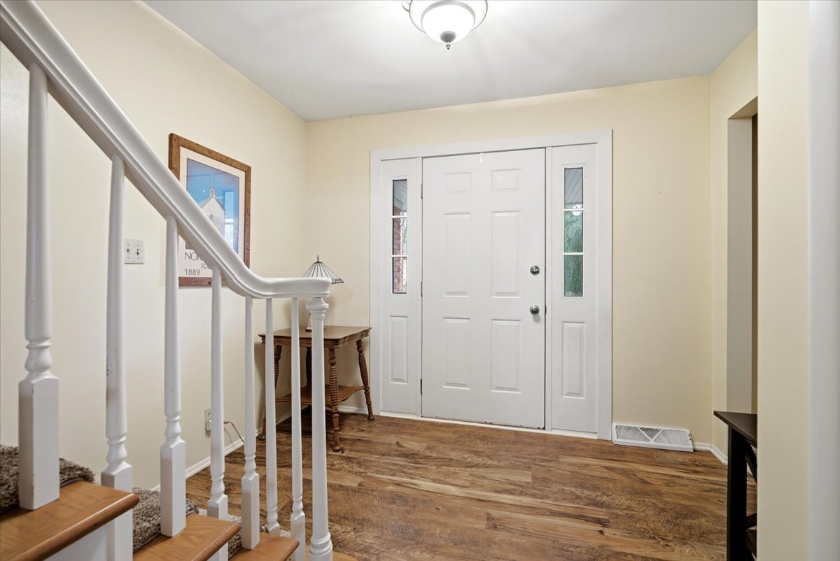 1204 Westview Drive Normal, IL 61761 - Photo 2 of 25 a view of an entryway with wooden floor