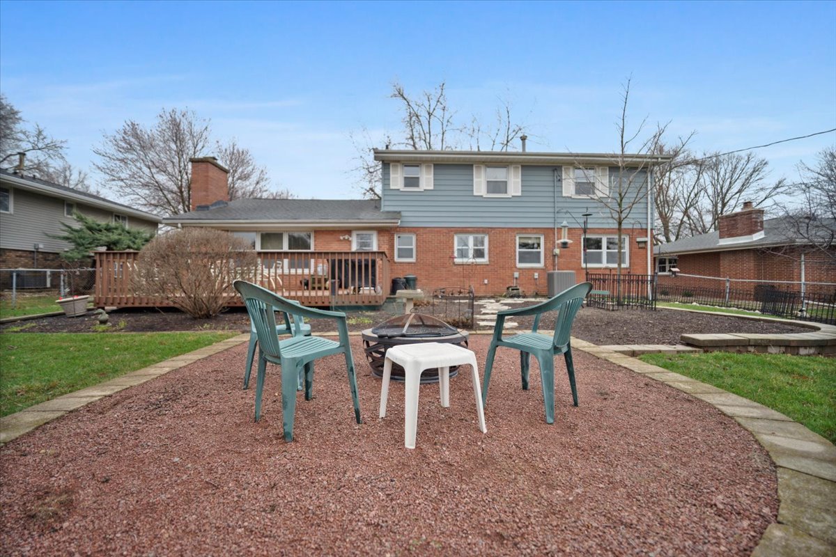 1204 Westview Drive Normal, IL 61761 - Photo 22 of 25 a view of a house with a yard