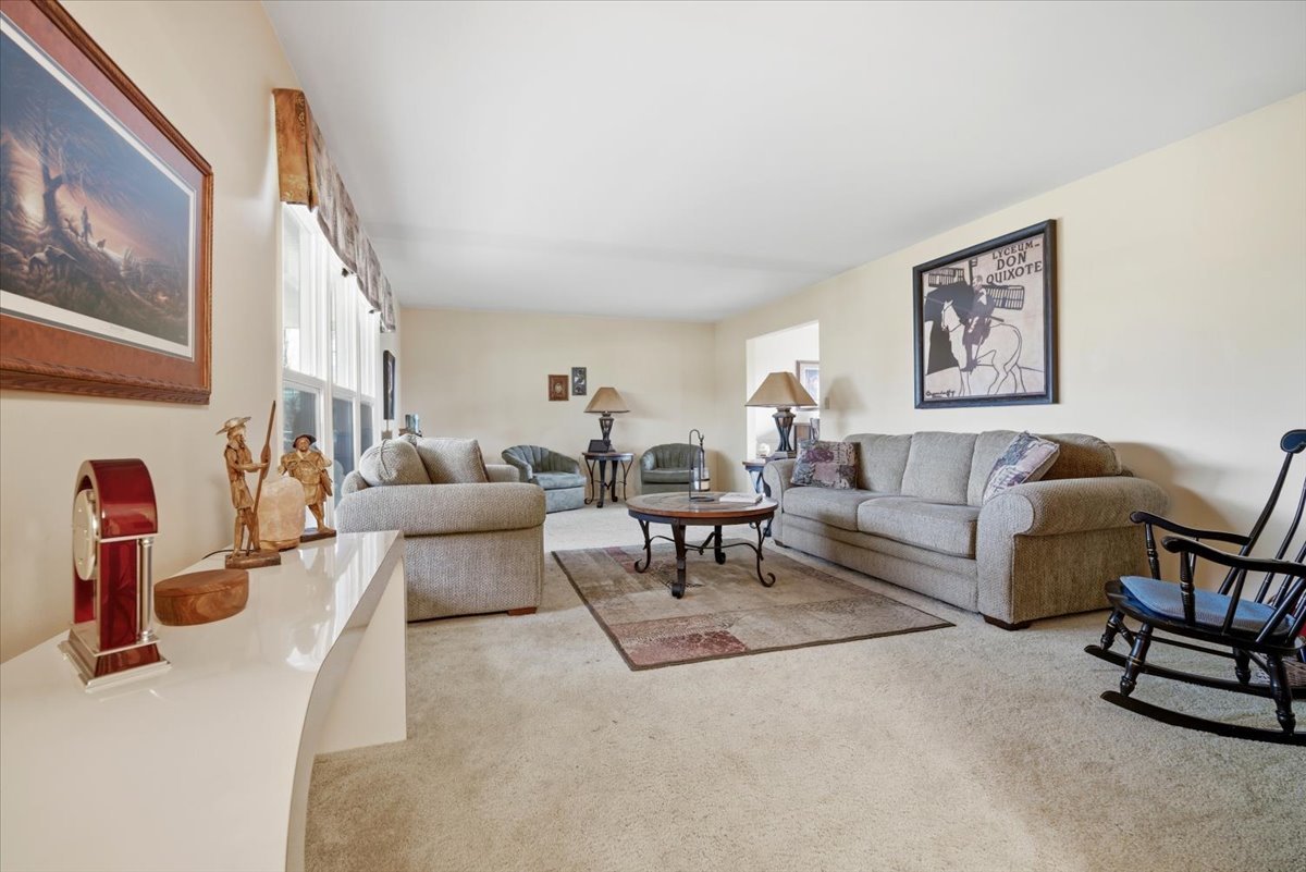 1204 Westview Drive Normal, IL 61761 - Photo 4 of 25 a living room with furniture and a potted plant