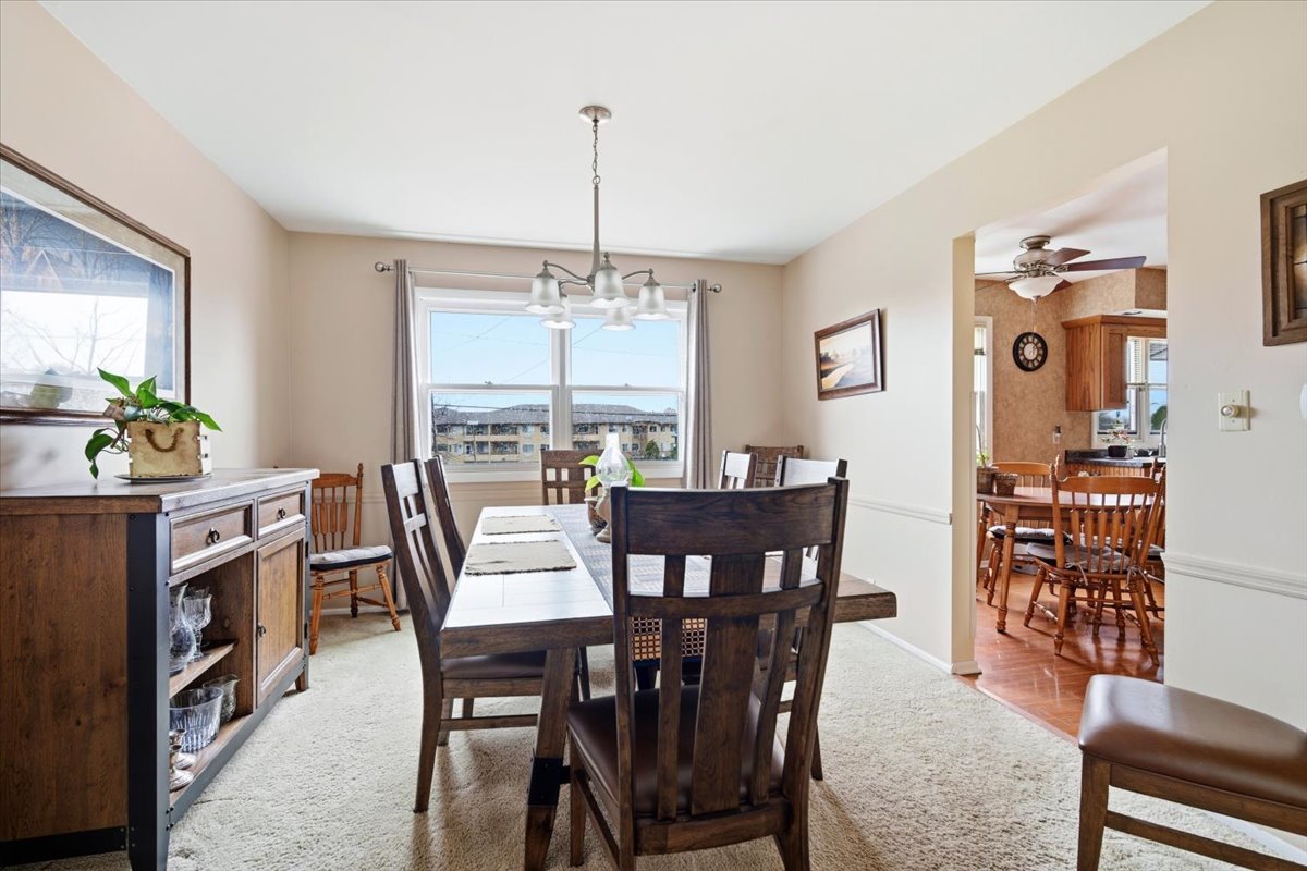 1204 Westview Drive Normal, IL 61761 - Photo 6 of 25 a view of a dining room with furniture