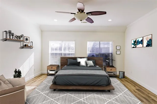 a bedroom with a bed couch and window