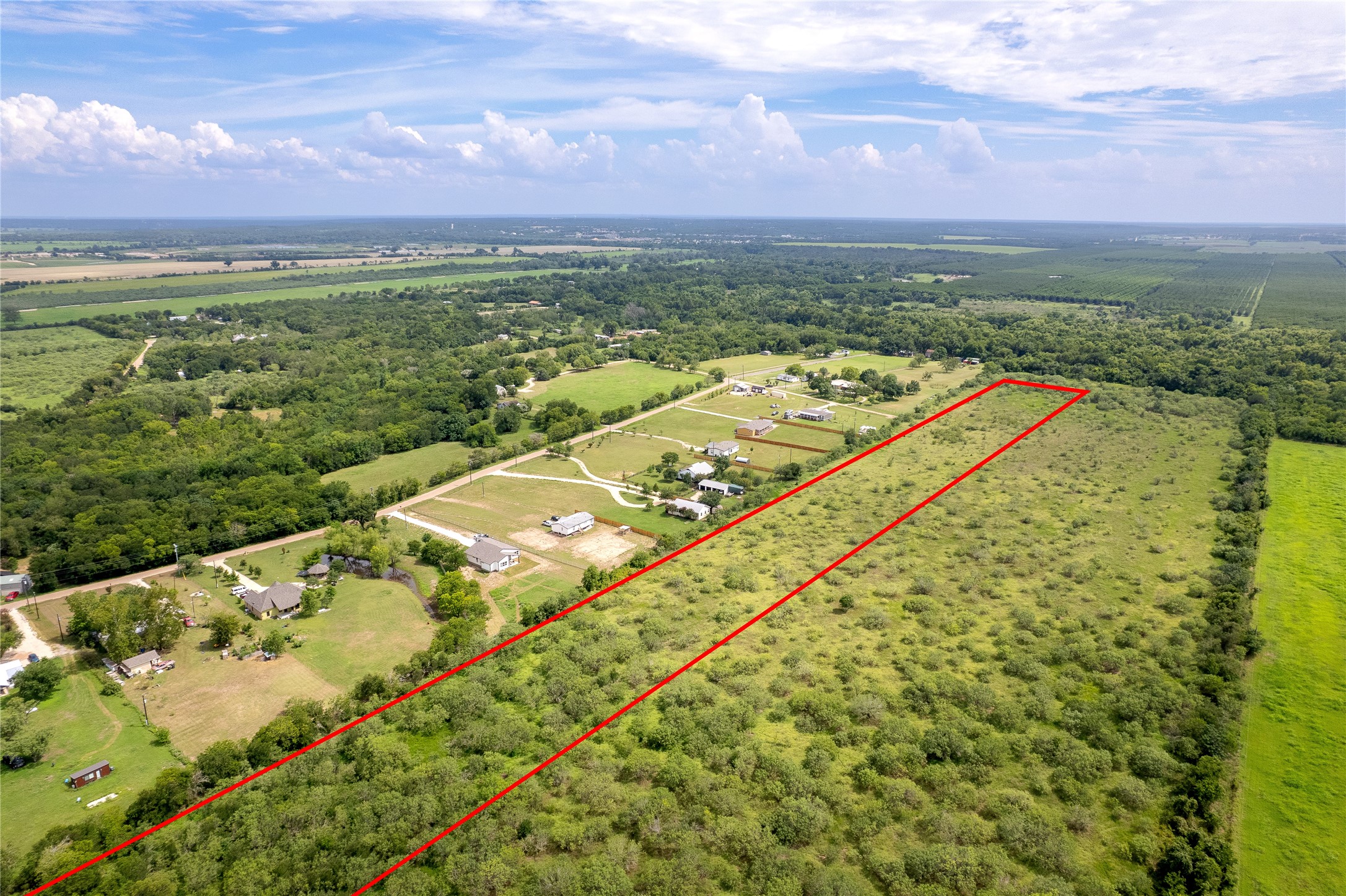 969 Rd Elgin Tx 78602 Road Elgin, TX 78621 - Photo 5 of 17 View of rural area featuring property parcel outlined