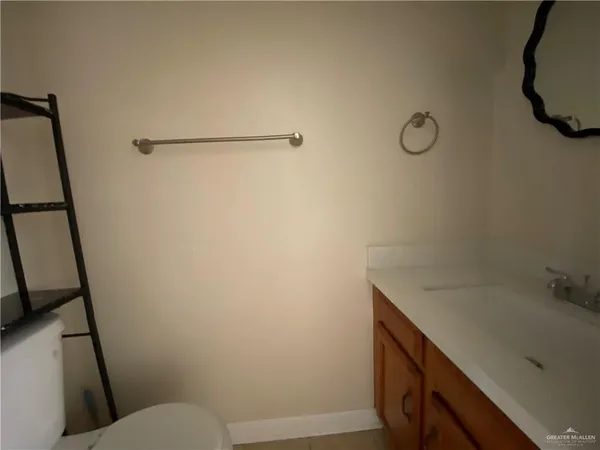 a bathroom with a sink and toilet