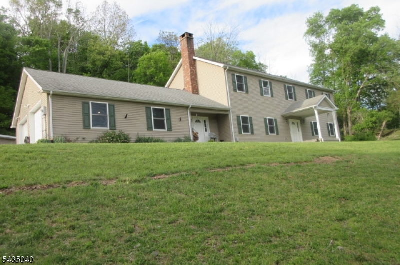 28 Beaver Run Road Lafayette, NJ 07848 - Photo 5 of 36 a front view of house with yard and green space