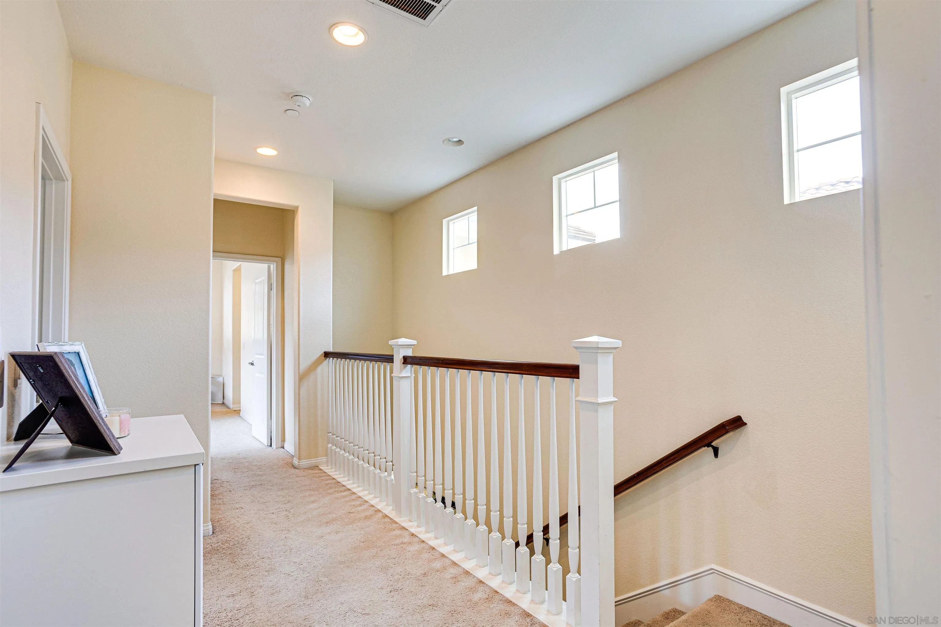 1447 Chert Drive San Marcos, CA 92078 - Photo 12 of 28 a view of a hallway with workspace