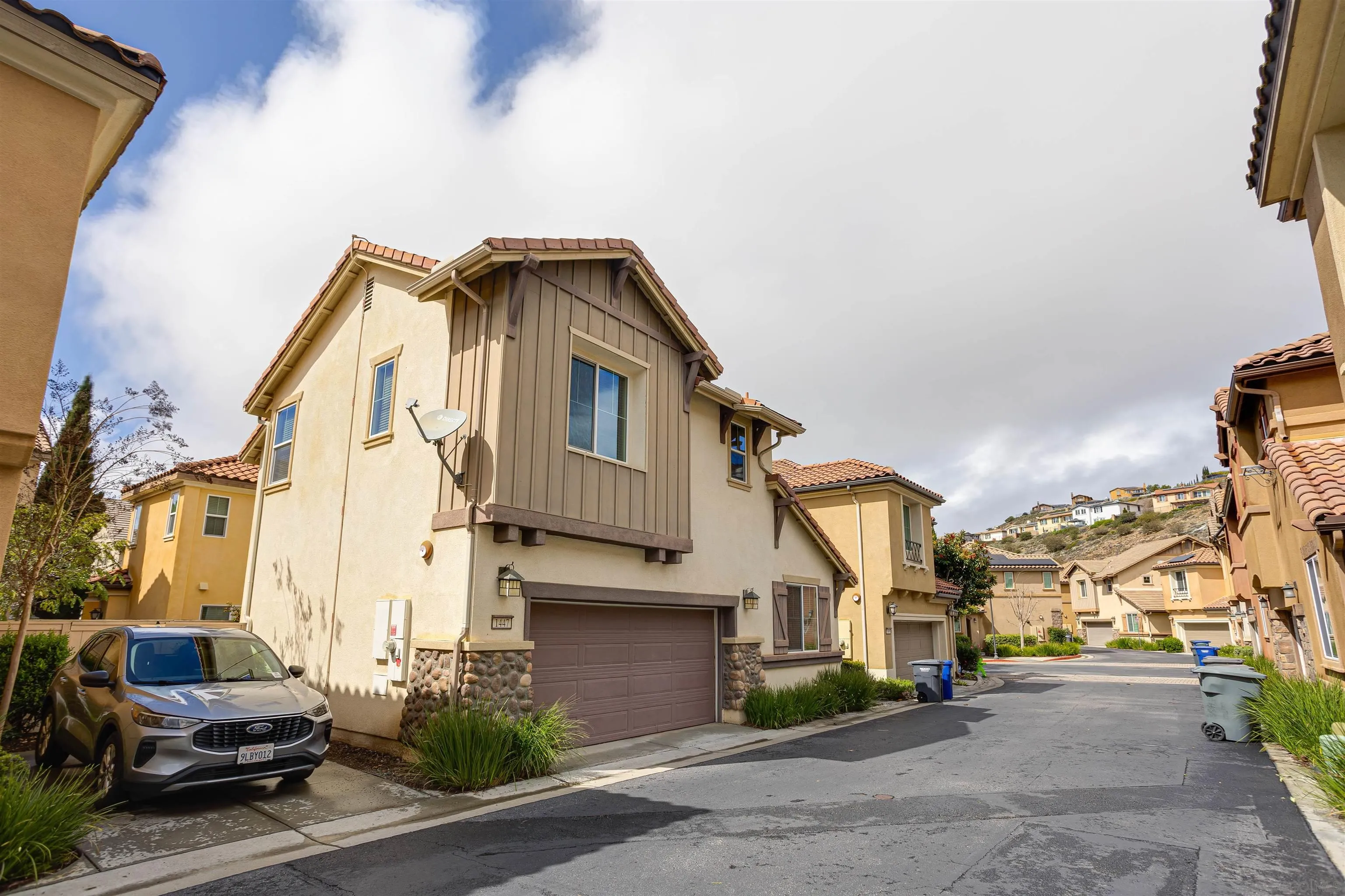 1447 Chert Drive San Marcos, CA 92078 - Photo 27 of 28 a front view of a house with a street