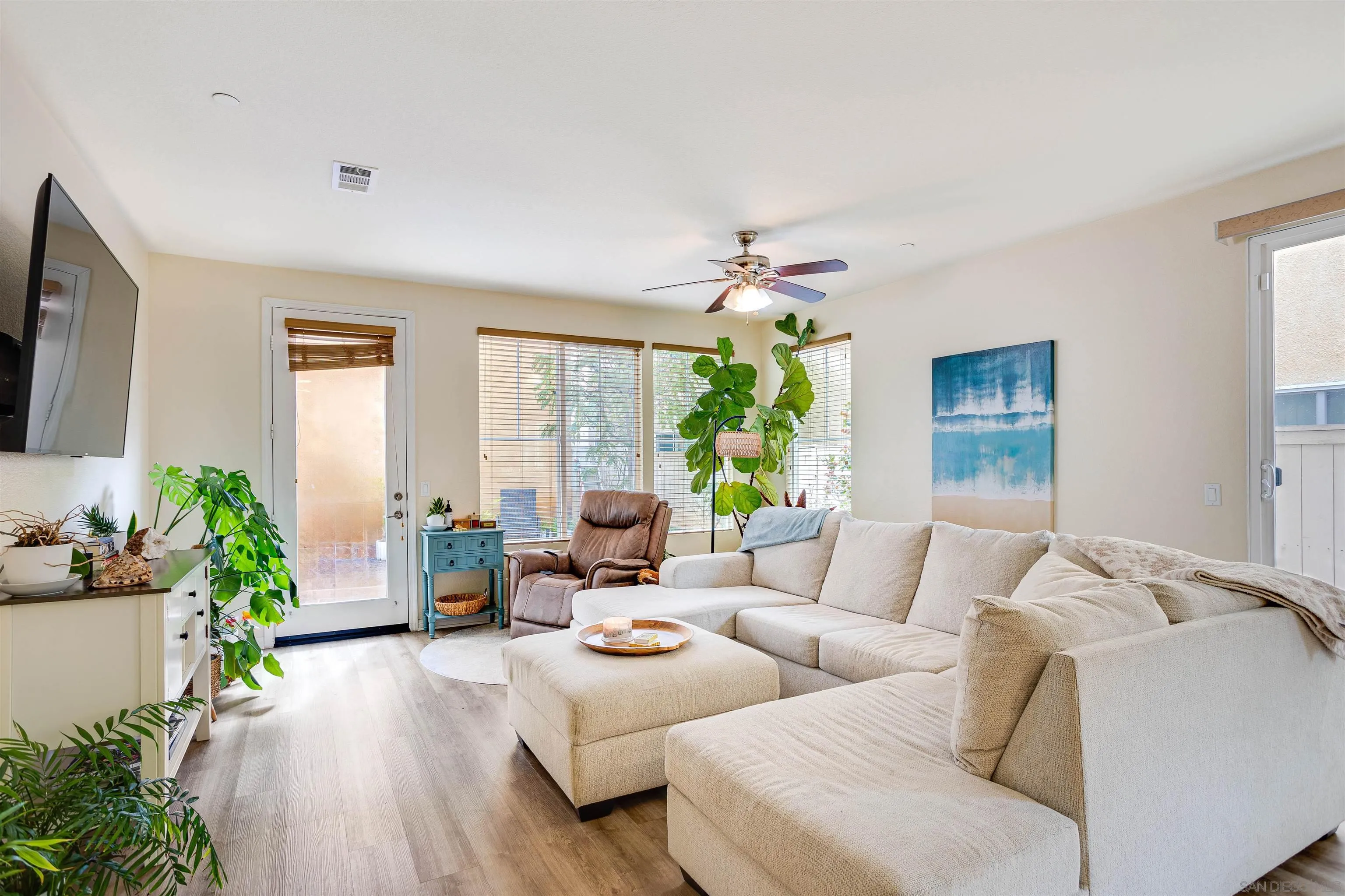 1447 Chert Drive San Marcos, CA 92078 - Photo 5 of 28 a living room with furniture and a chandelier