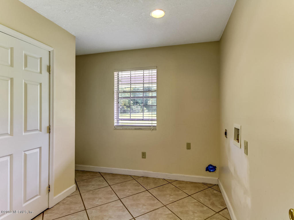 86051 Ellis Estates Landing Road Yulee, FL 32097 - Photo 12 of 35 a view of an empty room with a window