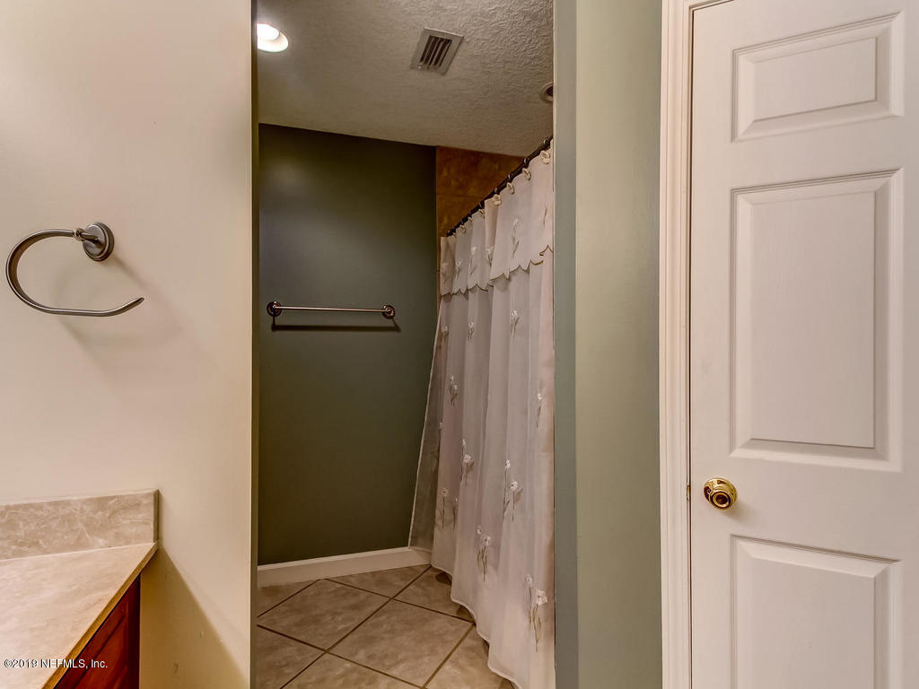 86051 Ellis Estates Landing Road Yulee, FL 32097 - Photo 18 of 35 a view of a kitchen from the hallway