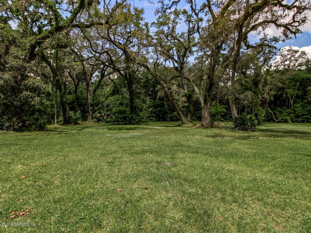 86051 Ellis Estates Landing Road Yulee, FL 32097 - Photo 30 of 35 a view of outdoor space with deck and yard