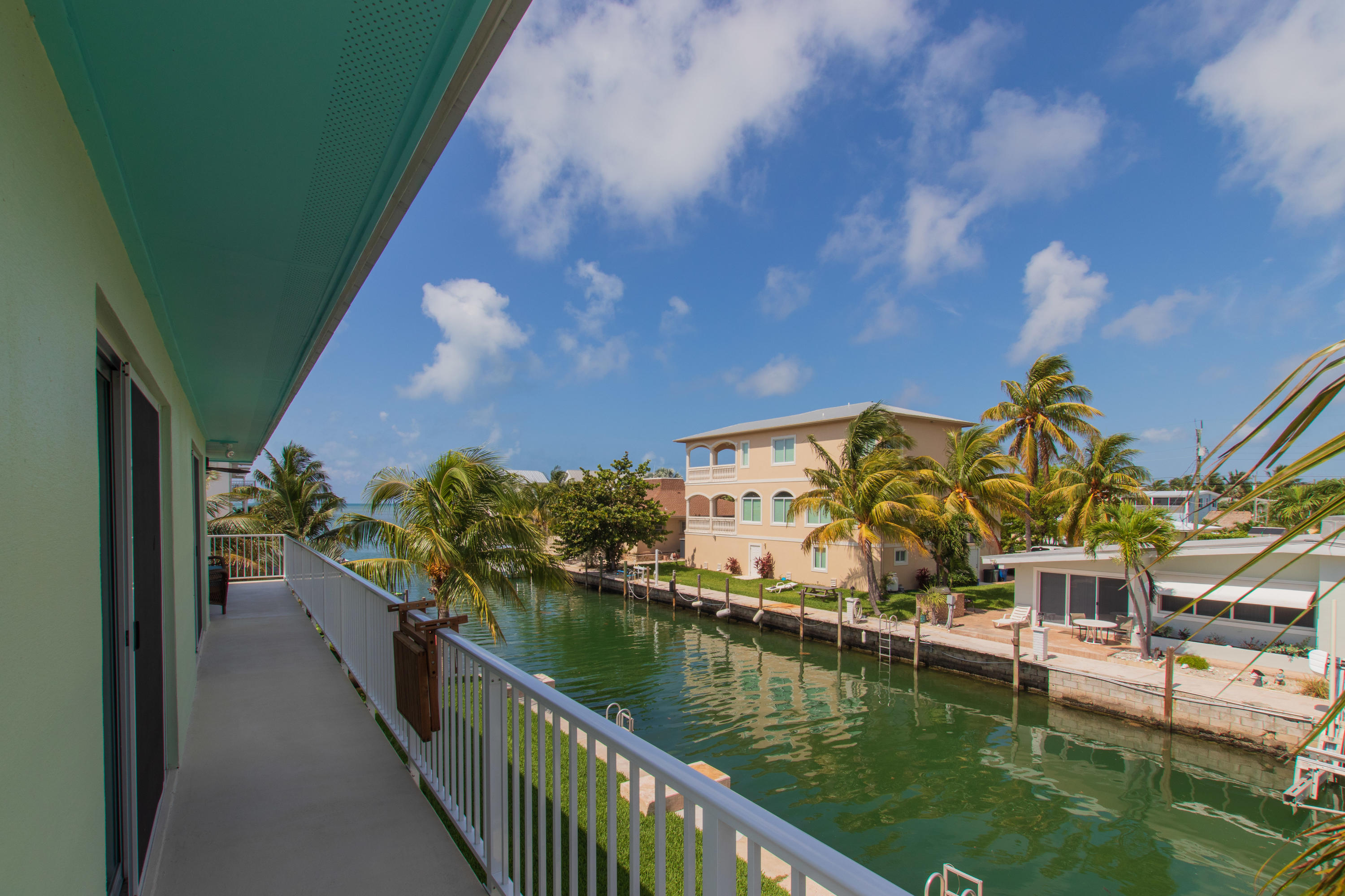 945 98th Street Marathon, FL 33050 - Photo 16 of 49 a view of swimming pool from a balcony