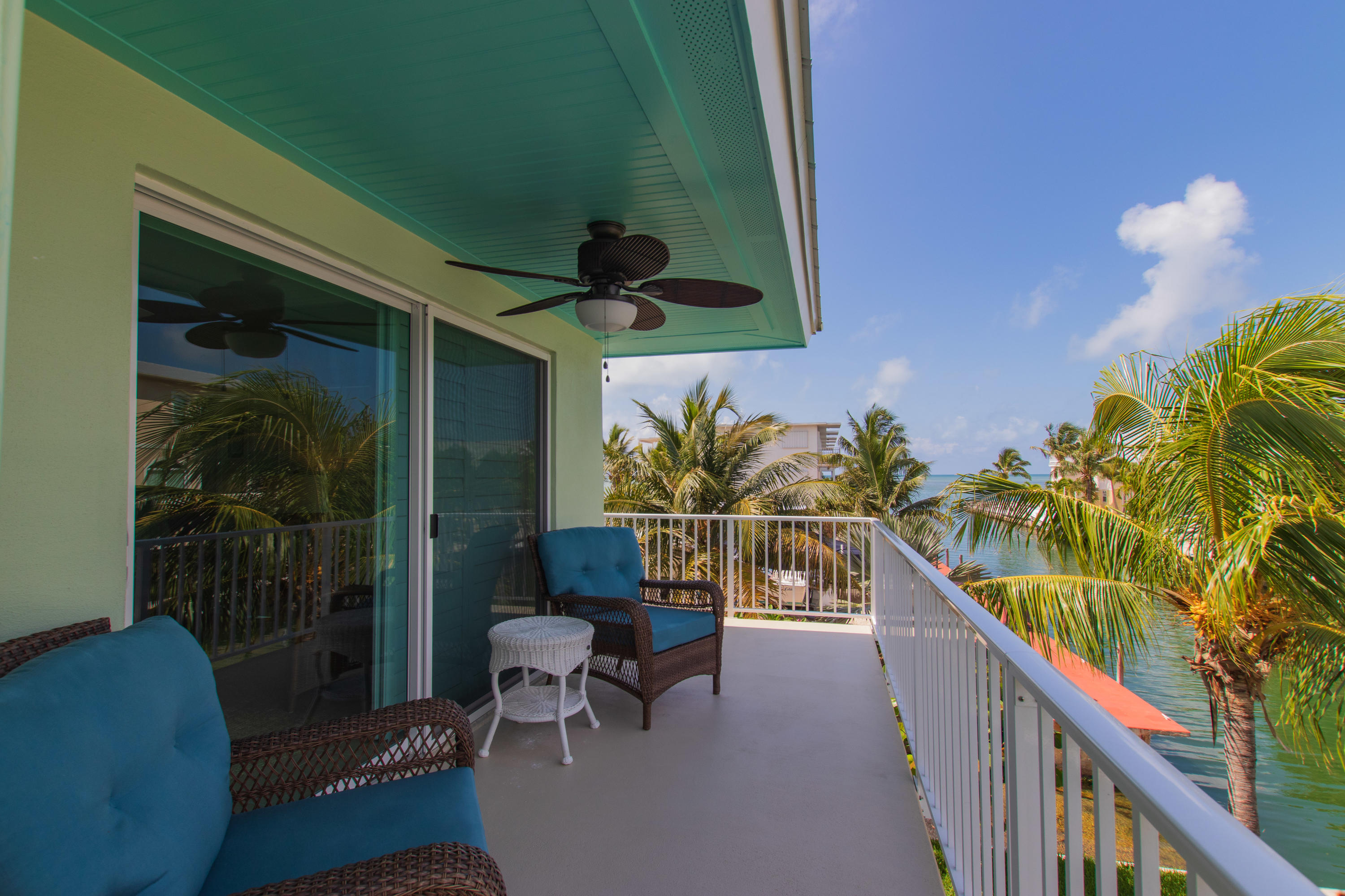 945 98th Street Marathon, FL 33050 - Photo 17 of 49 a view of a balcony with chairs
