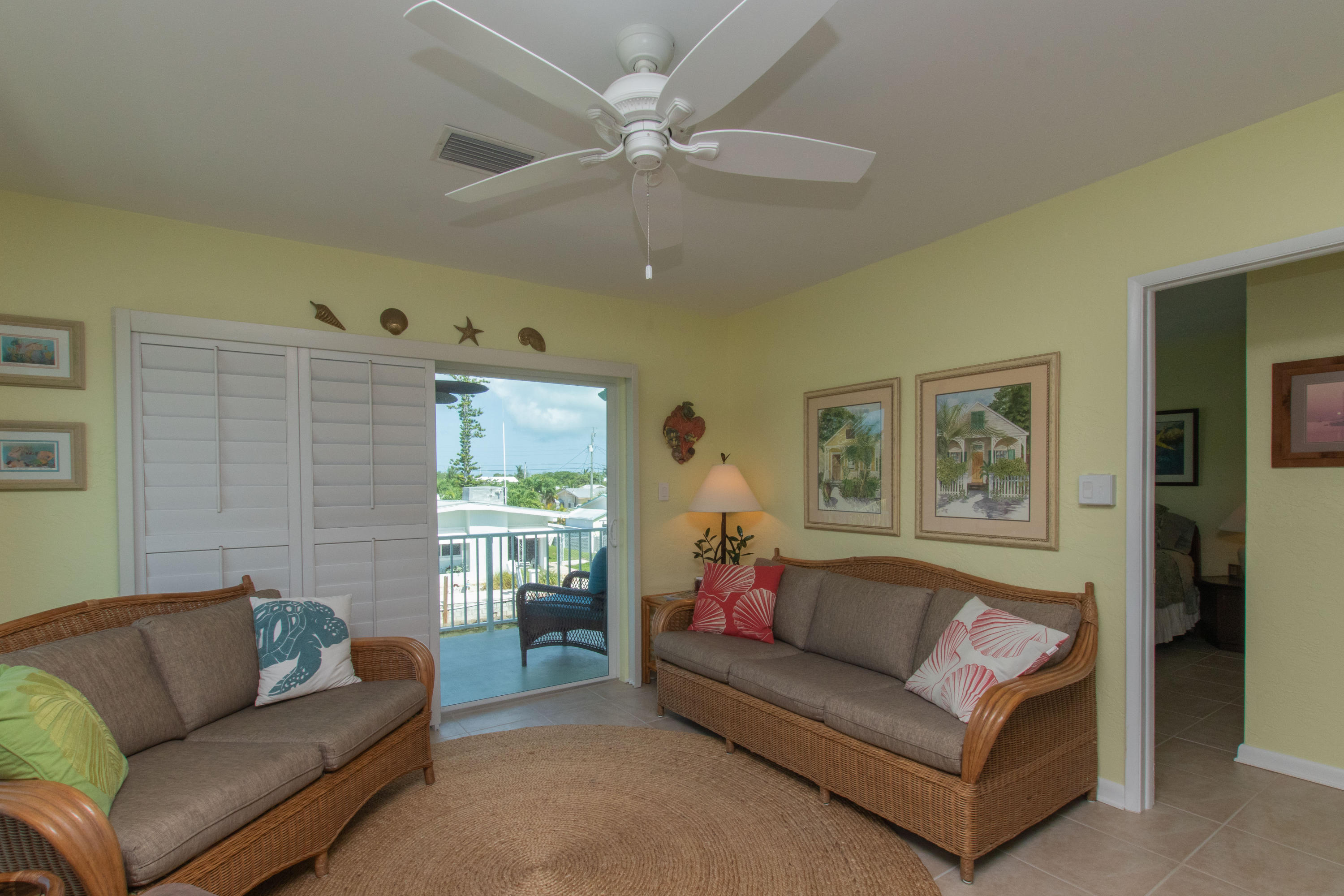 945 98th Street Marathon, FL 33050 - Photo 18 of 49 a living room with furniture and a window