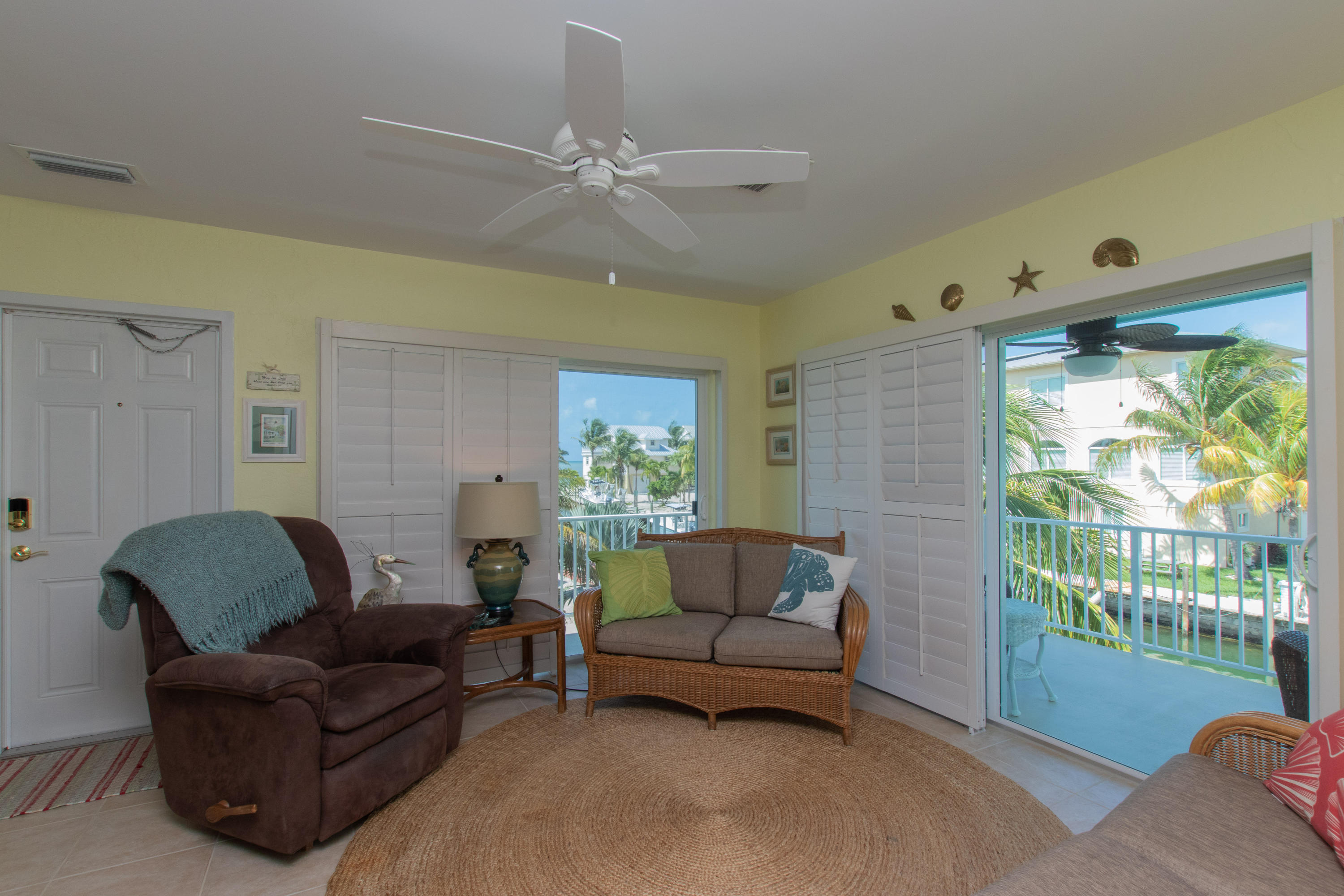 945 98th Street Marathon, FL 33050 - Photo 19 of 49 a living room with furniture and a window