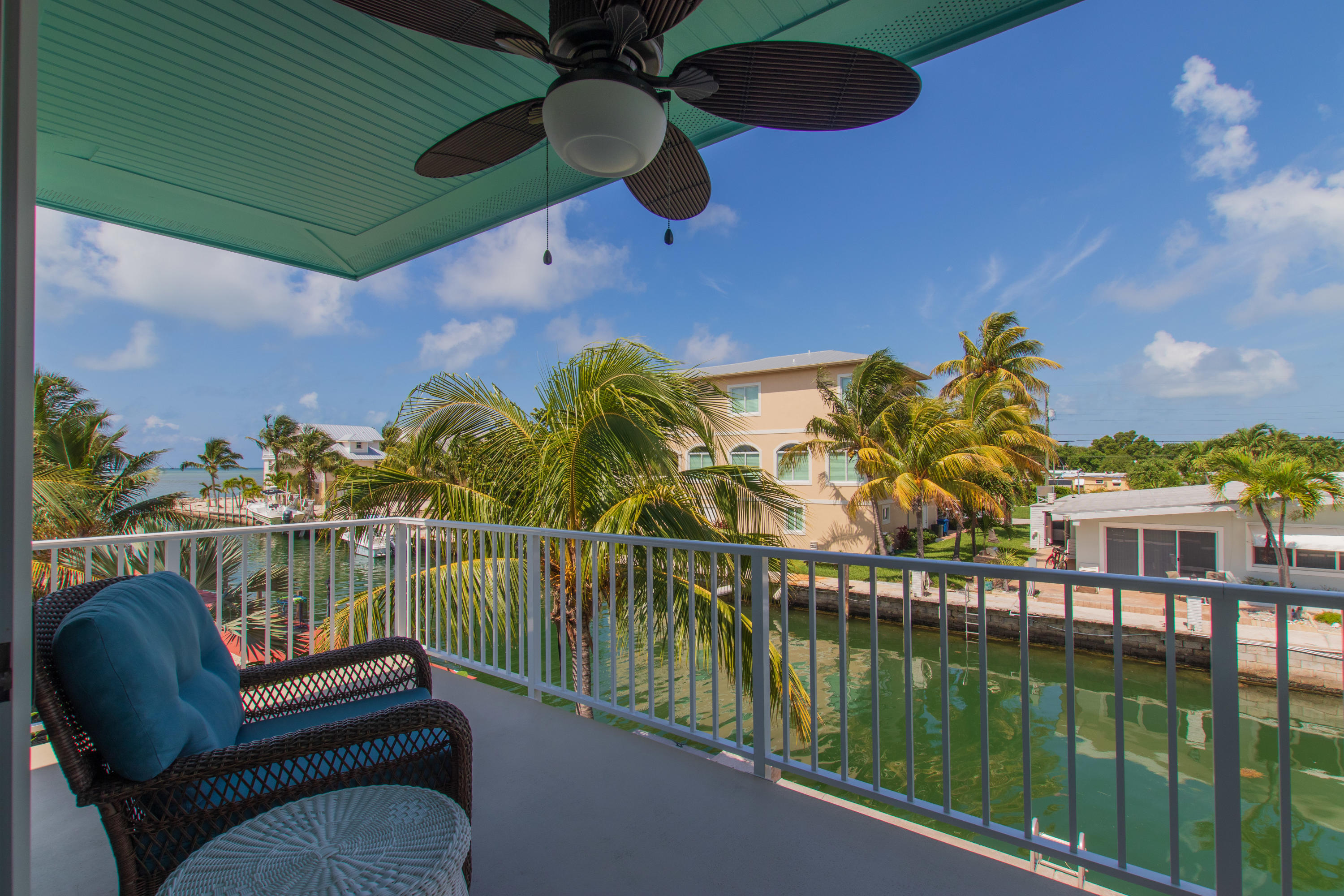 945 98th Street Marathon, FL 33050 - Photo 20 of 49 a view of a balcony with chairs