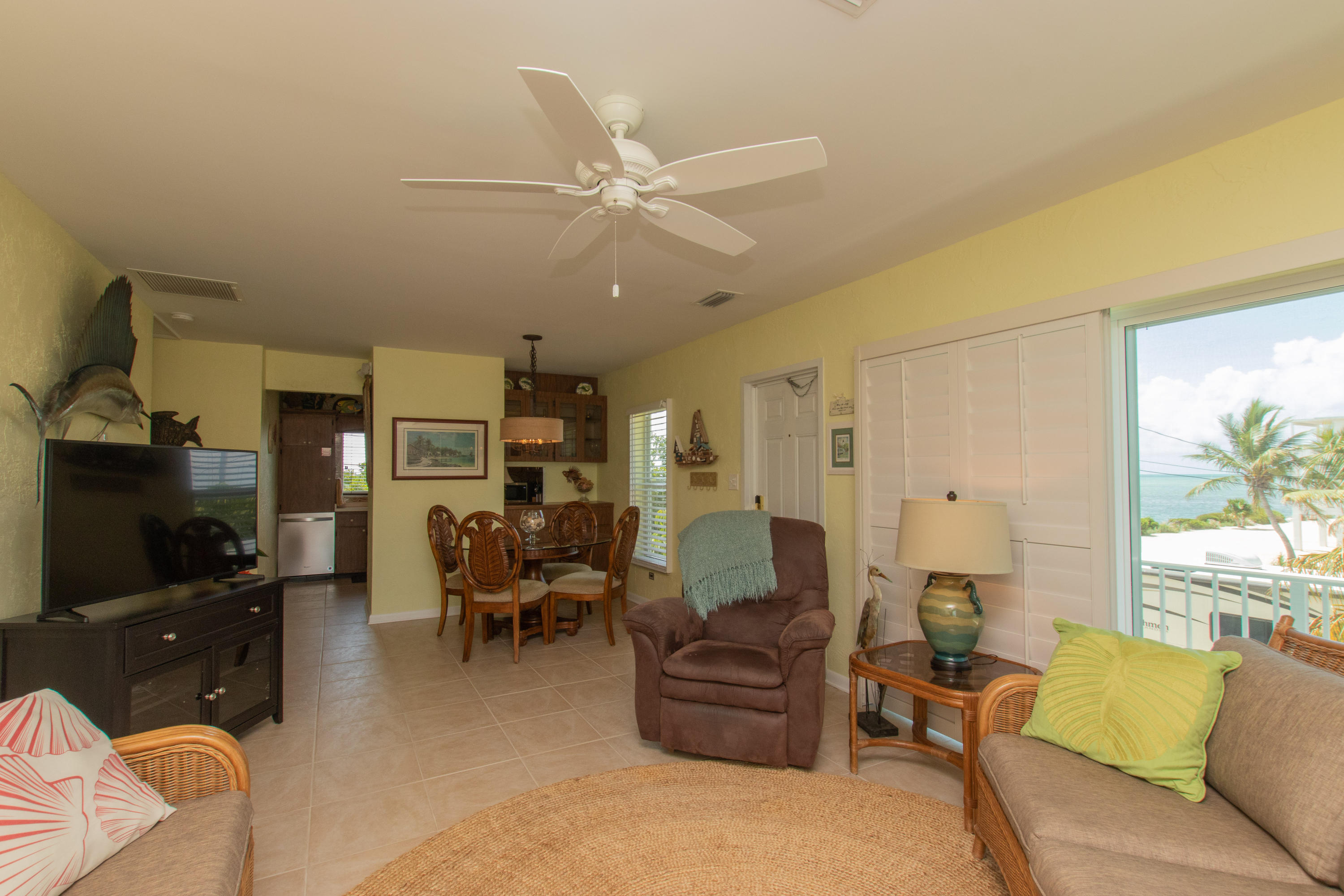 945 98th Street Marathon, FL 33050 - Photo 21 of 49 a living room with furniture and a flat screen tv