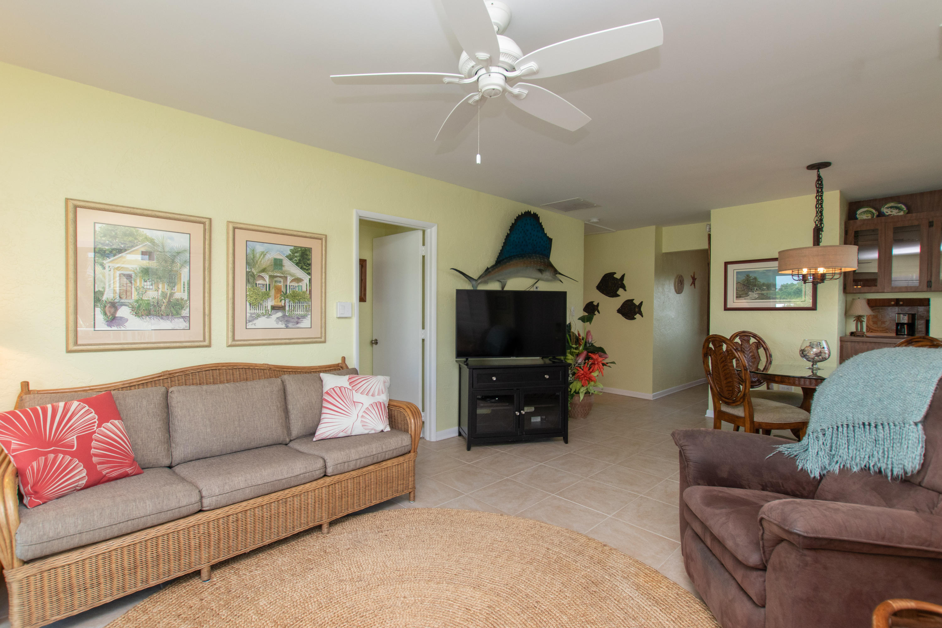 945 98th Street Marathon, FL 33050 - Photo 22 of 49 a living room with furniture and a flat screen tv