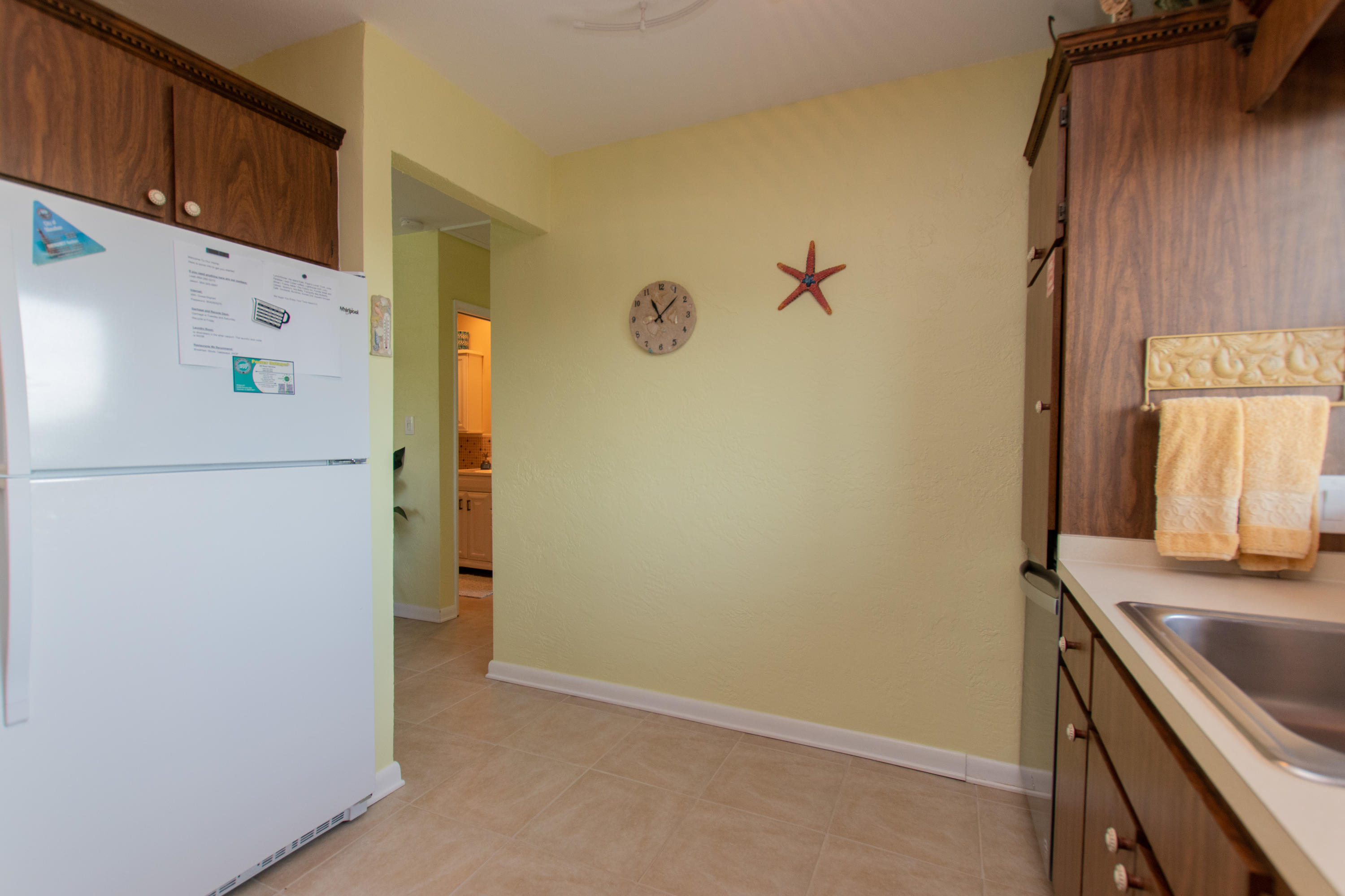 945 98th Street Marathon, FL 33050 - Photo 25 of 49 a kitchen with a refrigerator and a sink