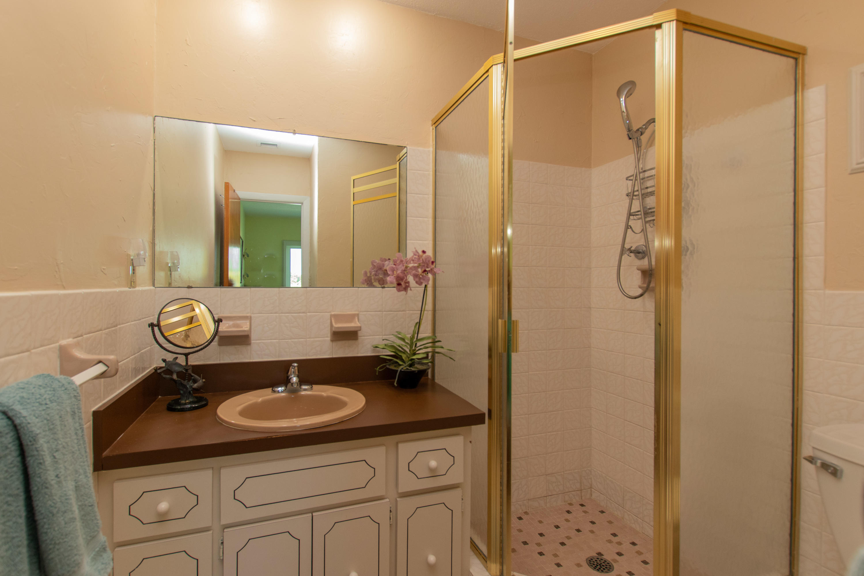 945 98th Street Marathon, FL 33050 - Photo 31 of 49 a bathroom with a sink a toilet and shower