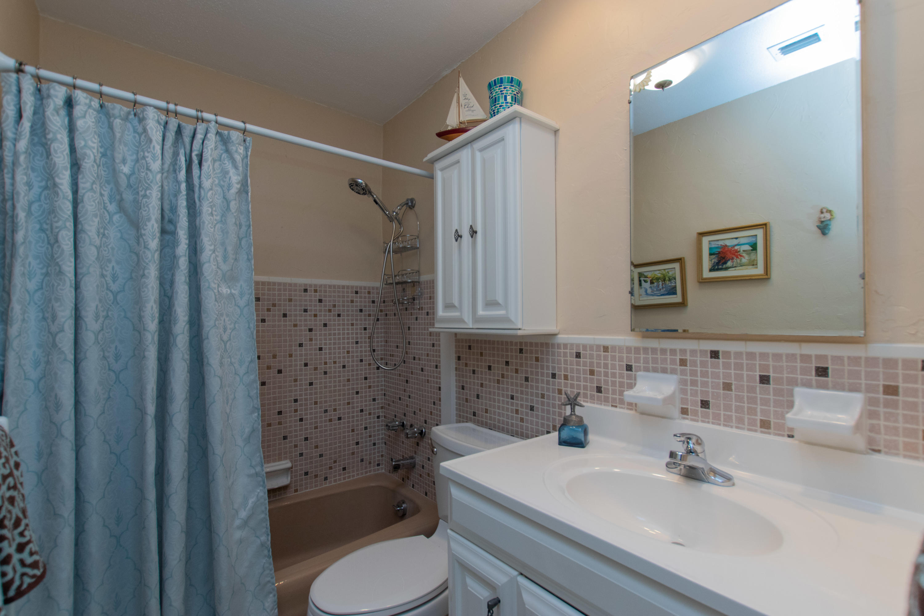 945 98th Street Marathon, FL 33050 - Photo 35 of 49 a bathroom with a sink toilet and shower
