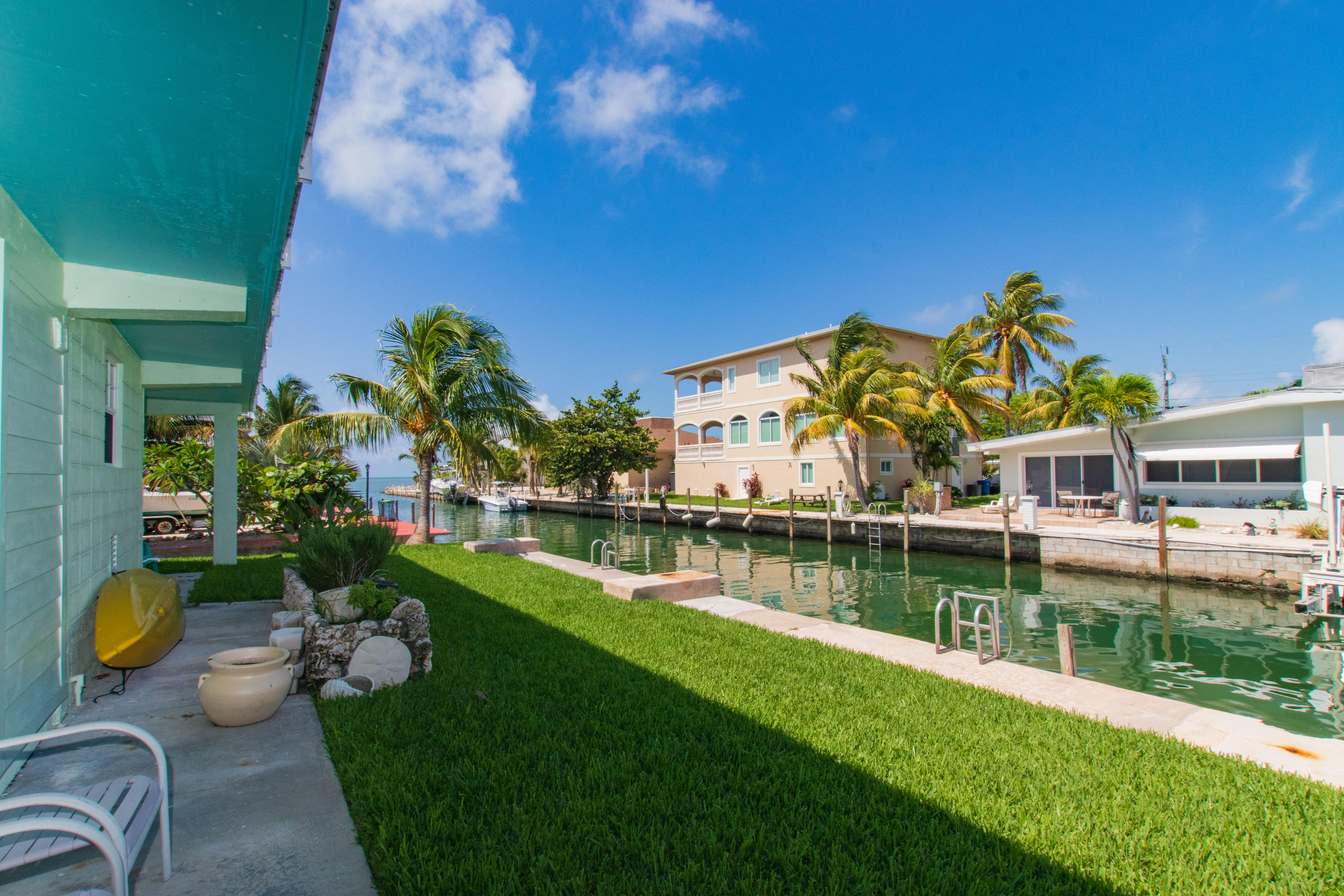 945 98th Street Marathon, FL 33050 - Photo 45 of 49 an aerial view of a house with swimming pool patio and outdoor seating