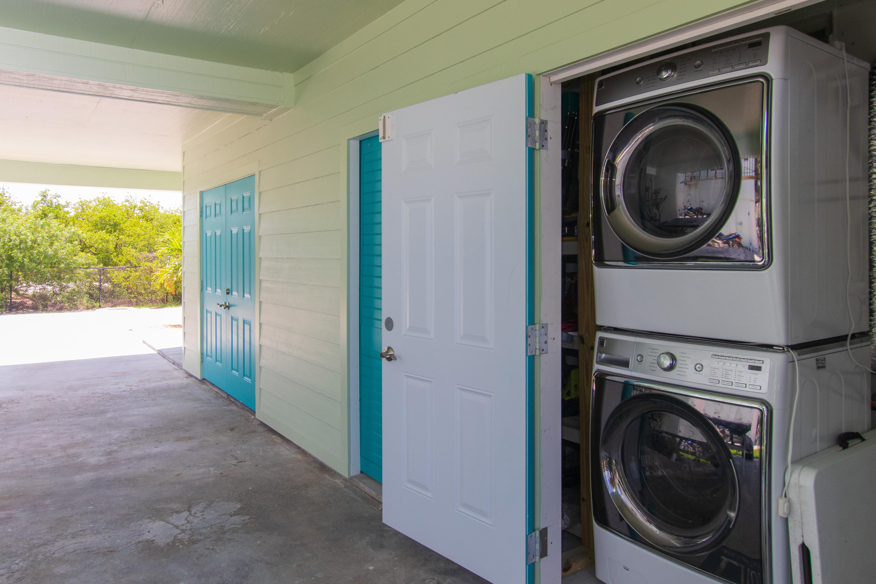 945 98th Street Marathon, FL 33050 - Photo 46 of 49 a view of a hallway with washer and dryer