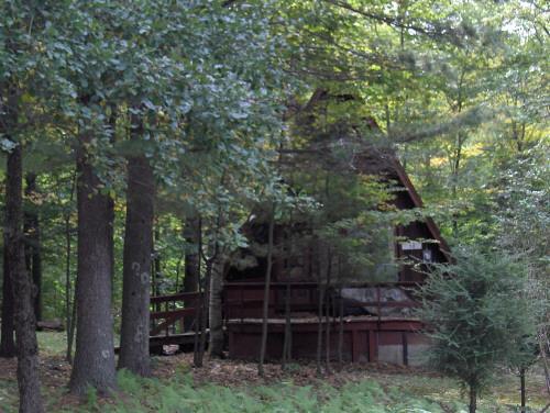 58 Cronk Road Monterey, MA 01245 - Photo 4 of 17 a backyard of a house with lots of green space and wooden fence