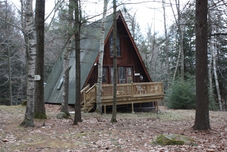 58 Cronk Road Monterey, MA 01245 - Photo 9 of 17 a view of house with a trees in the background