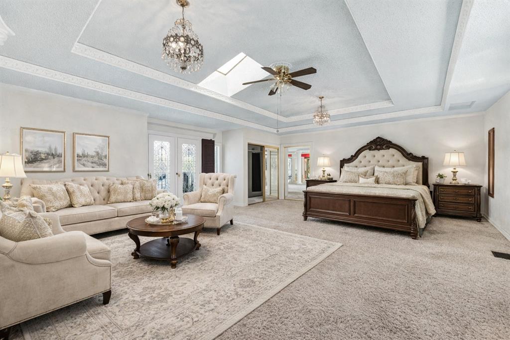 501 Colgate Drive Lancaster, TX 75134 - Photo 7 of 13 a living room with furniture and a chandelier