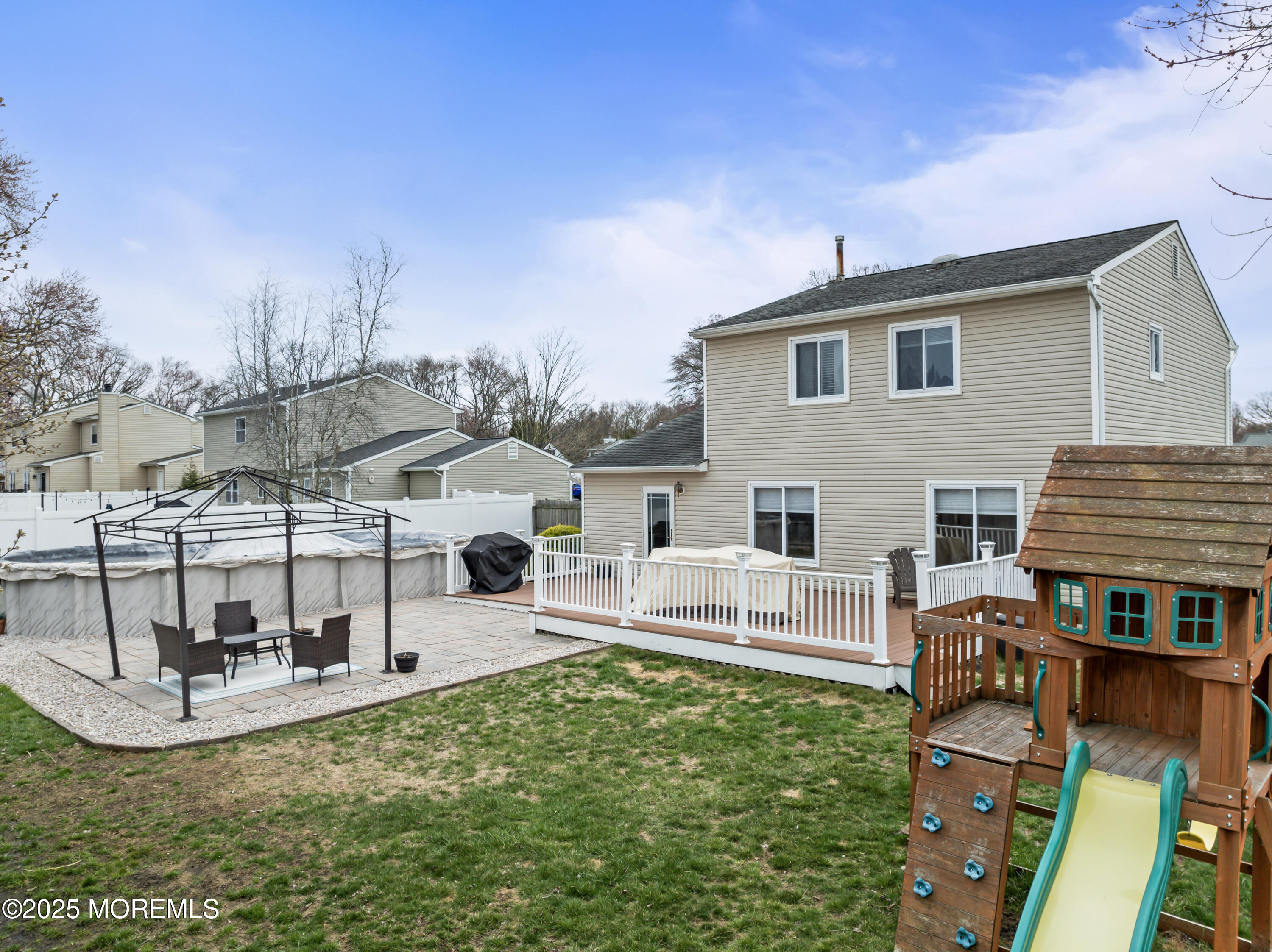 6 Blueberry Path Howell, NJ 07731 - Photo 29 of 38 a view of a house with patio and a yard