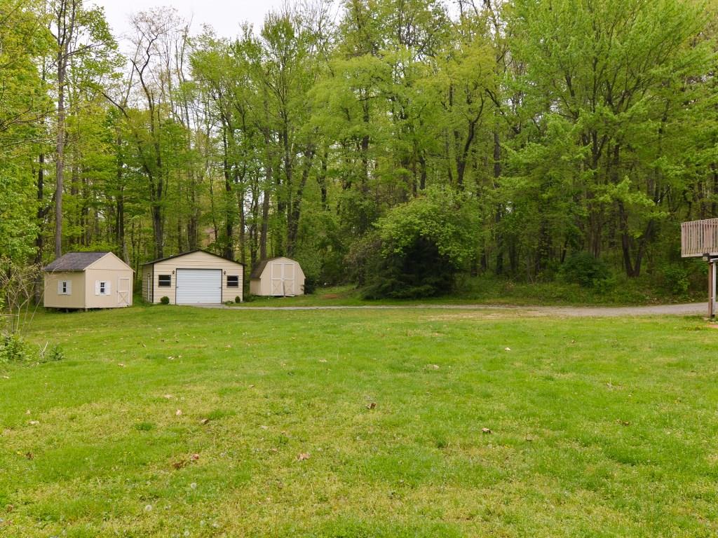 115 Syl Road Sewickley, PA 15143 - Photo 14 of 20 Back yard showing new metal barn/garage and 2 other storage sheds