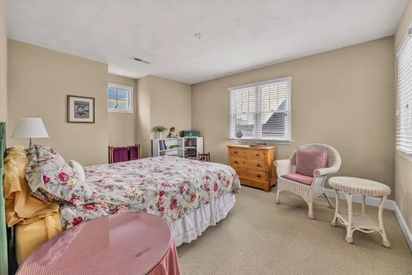 a room with furniture and a flat screen tv