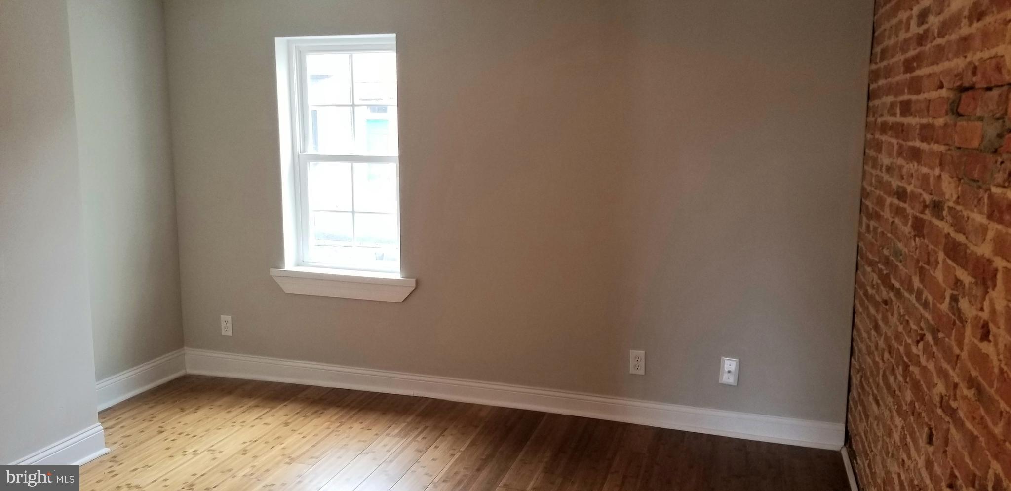 313 South Madeira Street Baltimore, MD 21231 - Photo 18 of 22 2nd Bedroom view with bamboo flooring