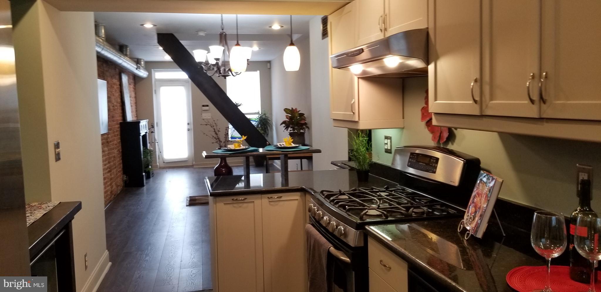 313 South Madeira Street Baltimore, MD 21231 - Photo 6 of 22 View from kitchen toward living area!