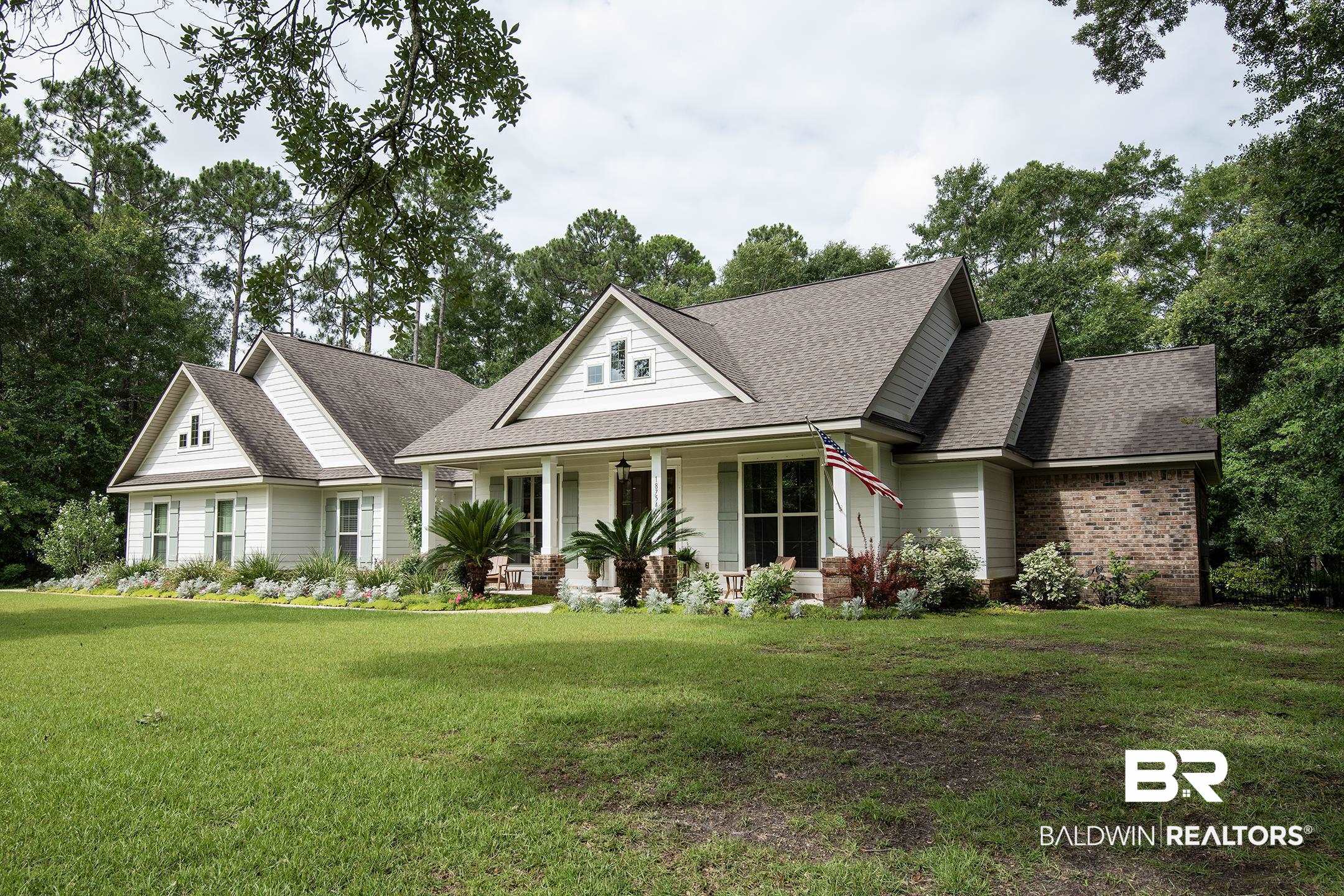 18754 Treasure Oaks Road Gulf Shores, AL 36542 - Photo 2 of 53 Front house