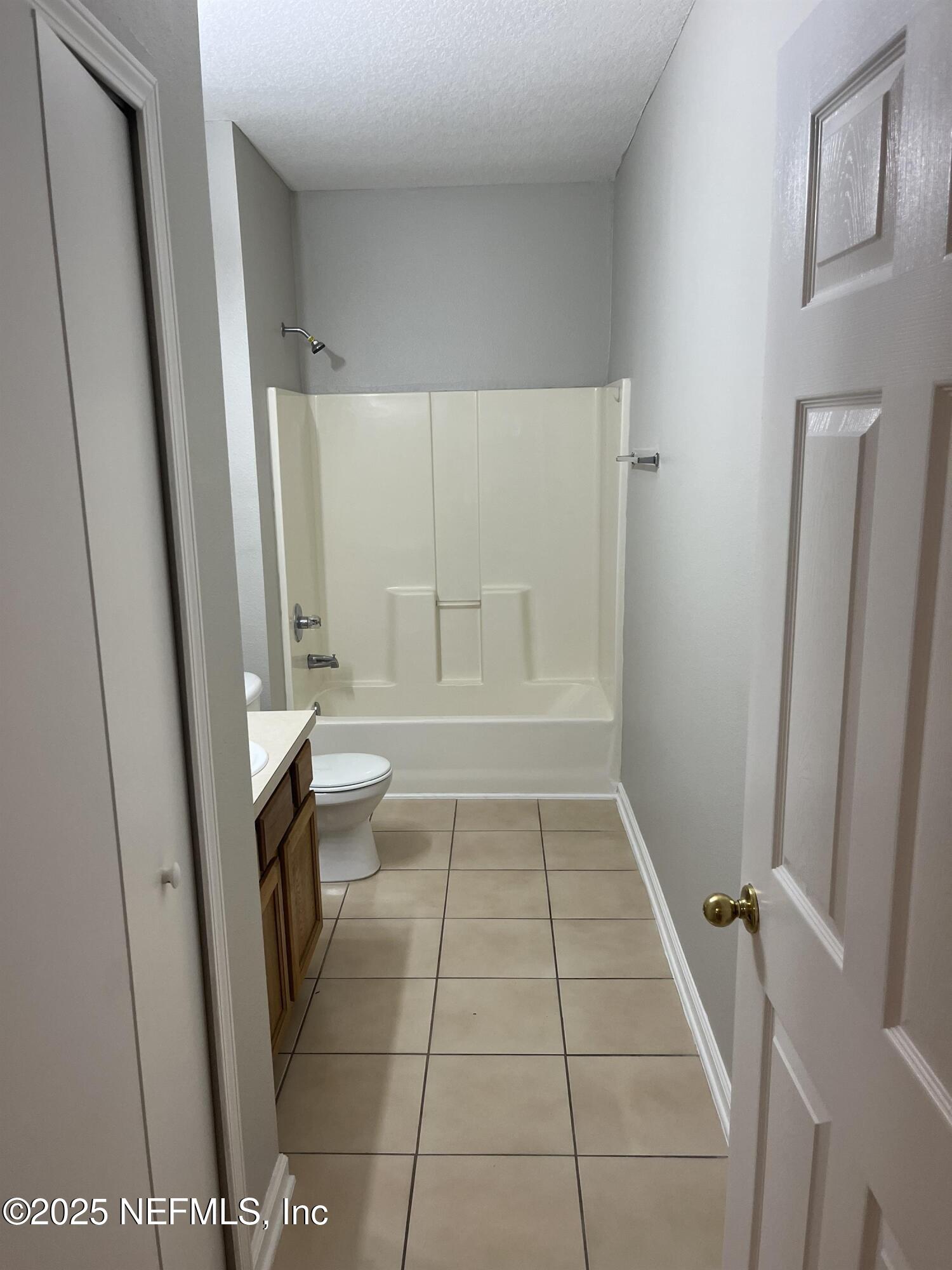 3680 Kirkpatrick Circle, Unit 3 Jacksonville, FL 32210 - Photo 2 of 7 a bathroom with a sink a toilet and a shower