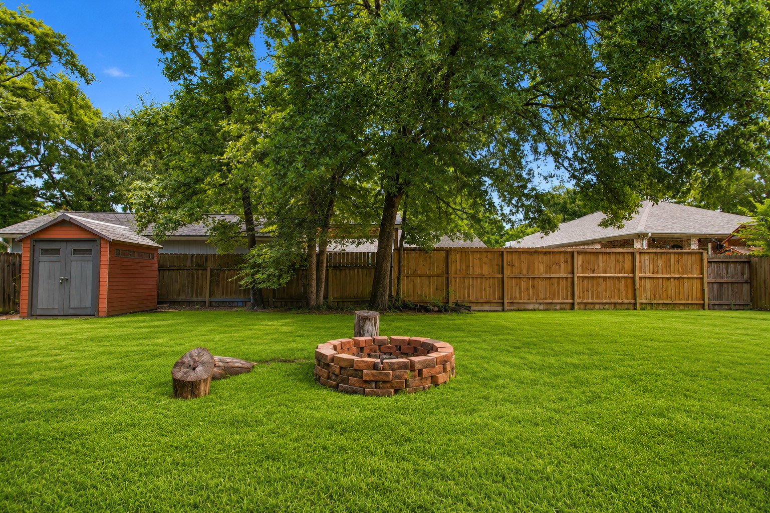 312 Springwood Drive Conroe, TX 77385 - Photo 47 of 50 Relax around the fire pit on cold winter nights while sipping a warm beverage or roasting marshmellows.