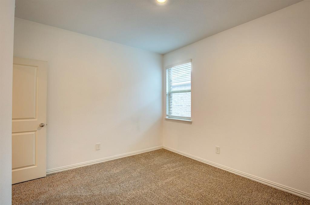 532 Ranchito Pass Haslet, TX 76052 - Photo 25 of 38 an empty room with windows