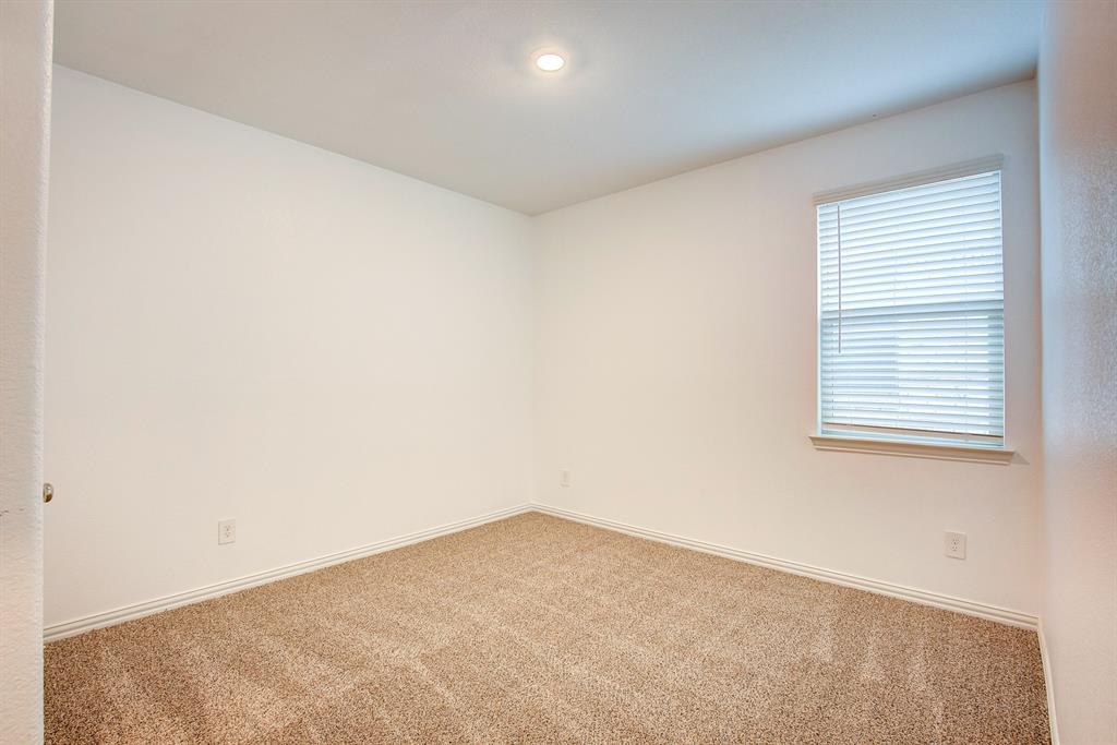 532 Ranchito Pass Haslet, TX 76052 - Photo 32 of 38 an empty room with a window